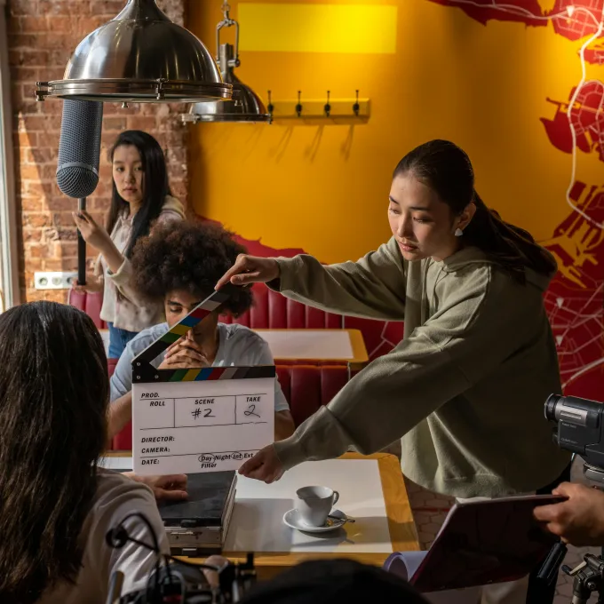 "group of people filming a story"